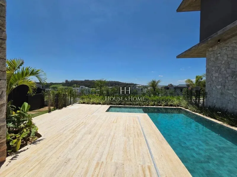 Casa com 4 dormitórios à venda, 455 m² por R$ 6.980.000,00 - Condomínio Villa Dos Pinheiro