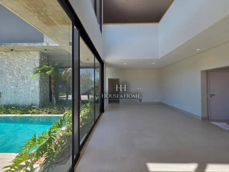 Casa com 4 dormitórios à venda, 455 m² por R$ 6.980.000,00 - Condomínio Villa Dos Pinheiro