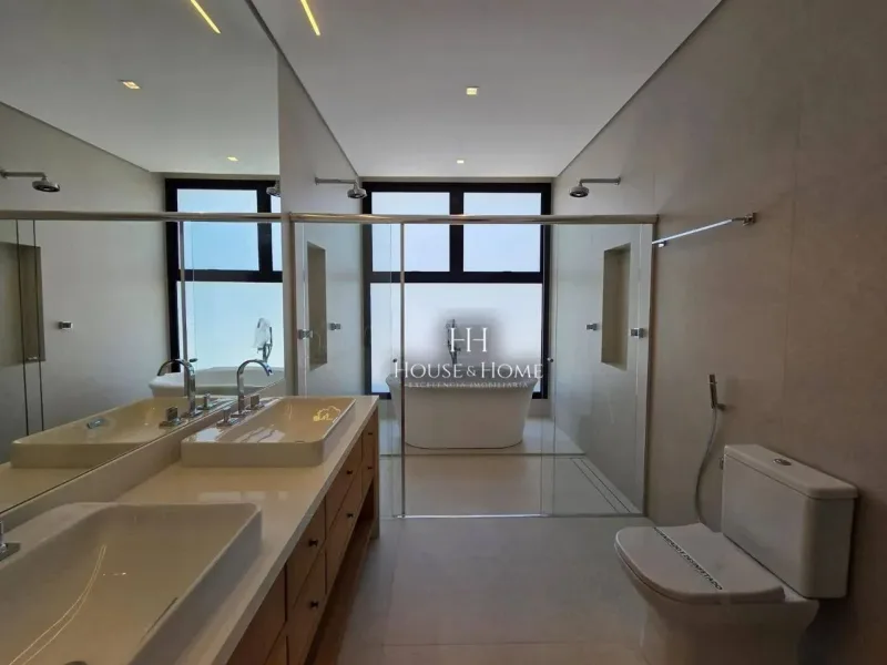 Casa com 4 dormitórios à venda, 455 m² por R$ 6.980.000,00 - Condomínio Villa Dos Pinheiro
